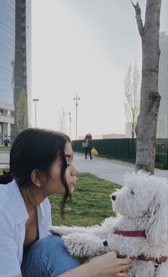 Vittoria Rho, an exchange student from Milan, Italy and her dog, Muffin.